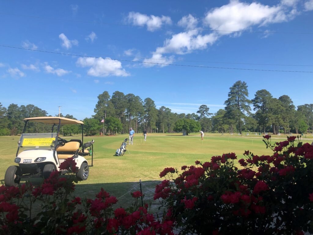 Golfers enjoying a sunday day at Pine Crest Golf Club.